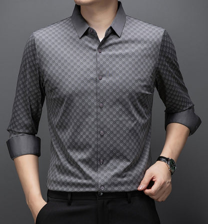 Men wearing Atmora grey printed full sleeve stretch shirt styled with black trousers for smart casual wear
