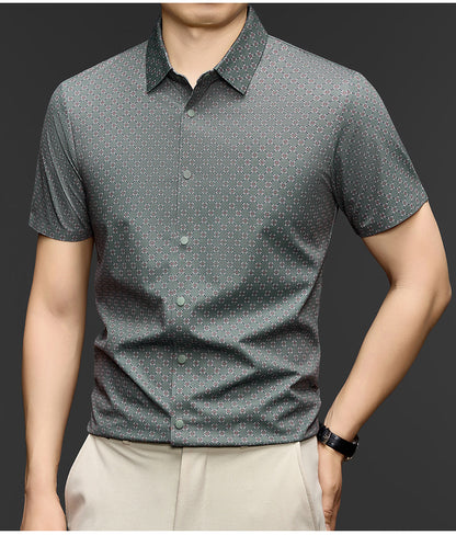Men wearing Atmora sage lattice print short sleeve stretch shirt styled with beige trousers