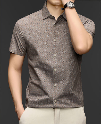 Men wearing Atmora taupe beige motif print imported stretch short sleeve shirt with beige trousers