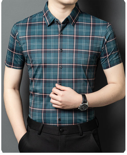 Men wearing Atmora teal slate heritage check short sleeve shirt styled with black trousers
