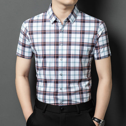 Men wearing Atmora white heritage check short sleeve shirt styled with black trousers