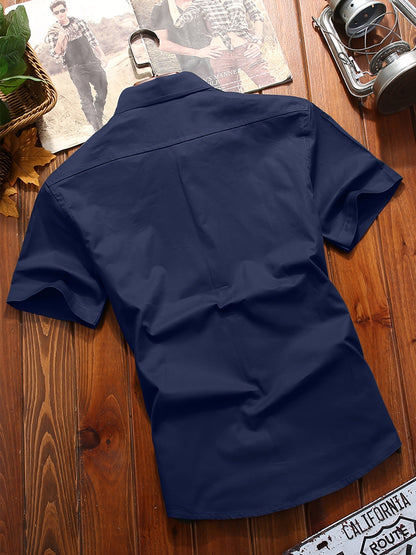 Back view of Atmora men's midnight navy woven short sleeve utility shirt with plain back and yoke seam