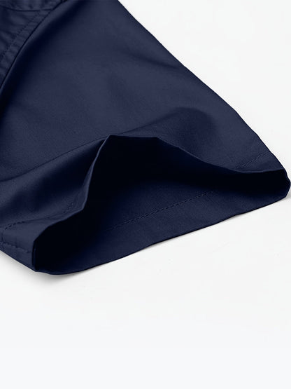 Detailed view of Atmora midnight navy woven short sleeve shirt fabric, seam and sleeve hem