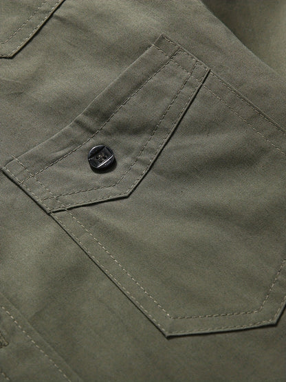 Atmora olive green utility shirt close-up of buttoned flap chest pocket and stitched seam