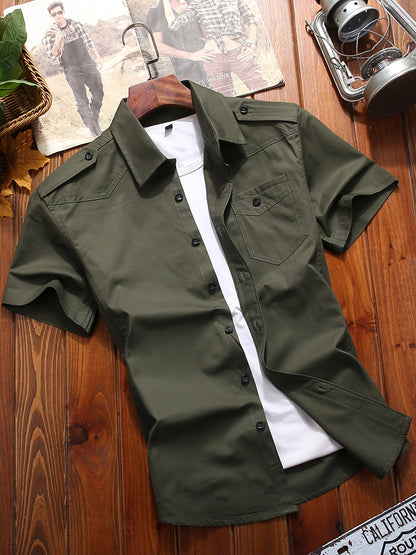 Atmora men's olive green woven utility short sleeve shirt front view with button-flap chest pocket and shoulder tabs