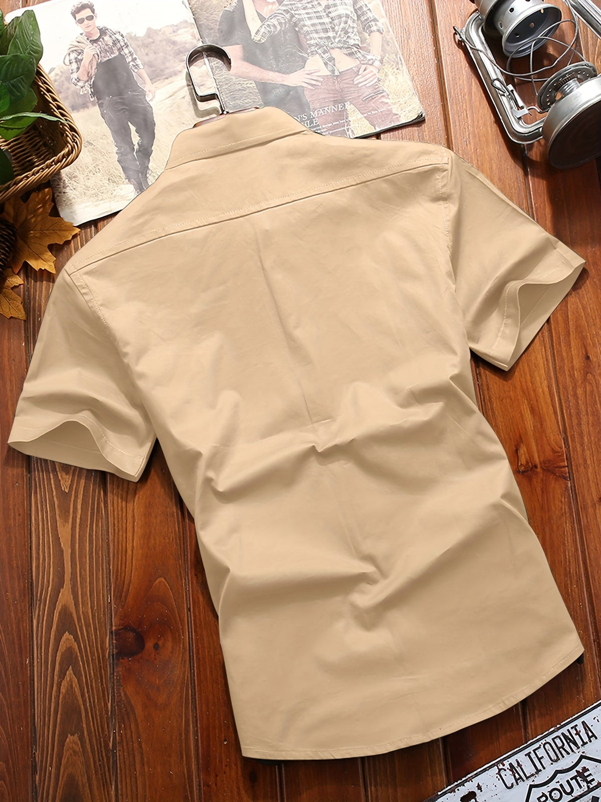 Back view of Atmora sand beige woven utility short sleeve shirt with plain back and yoke seam