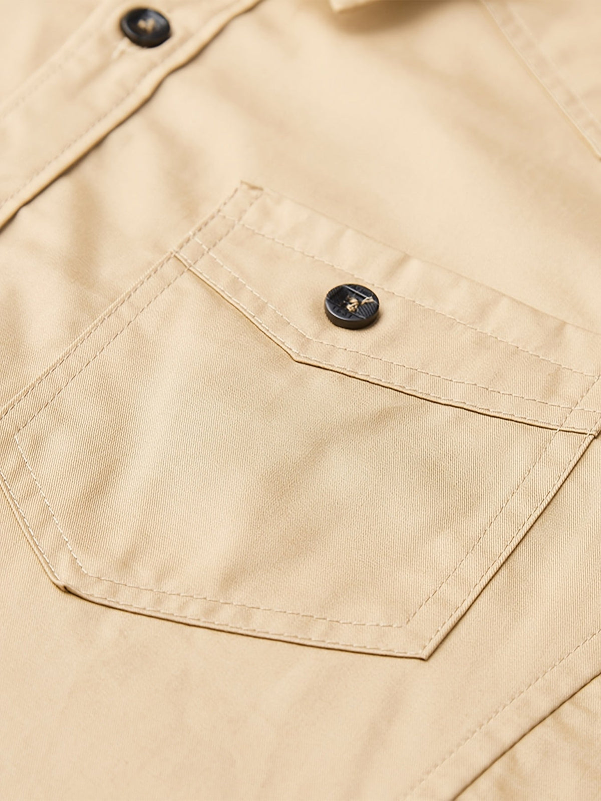 Close-up of Atmora sand beige woven short sleeve shirt button-flap chest pocket