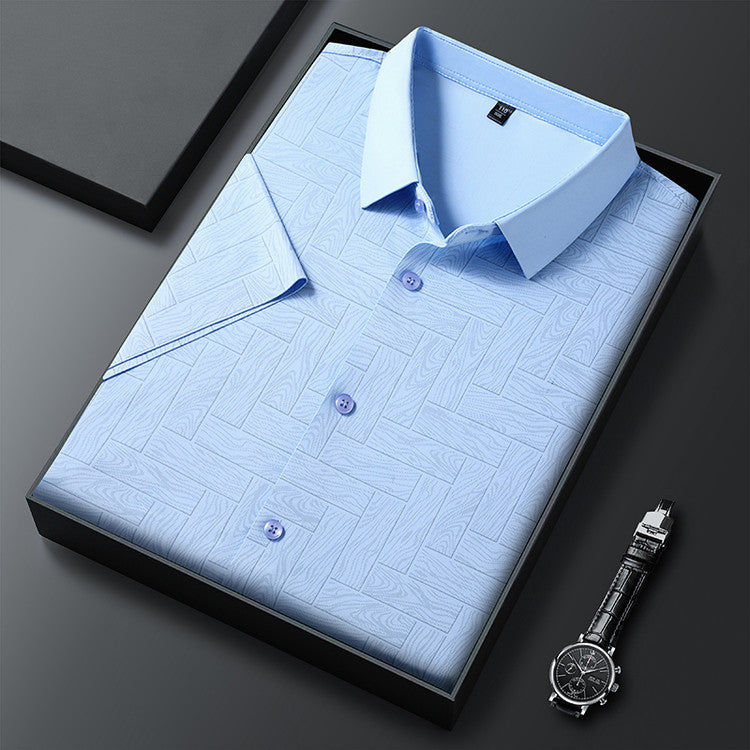 Folded Atmora men’s sky blue textured imported stretch shirt with classic collar and button front detail