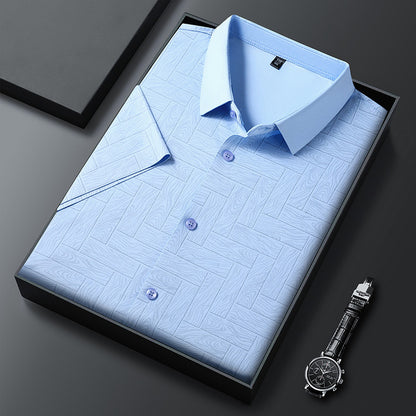 Folded Atmora men’s sky blue textured imported stretch shirt with classic collar and button front detail