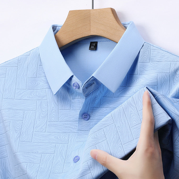 Close-up of Atmora men’s sky blue textured short sleeve shirt showing imported stretch fabric and classic collar