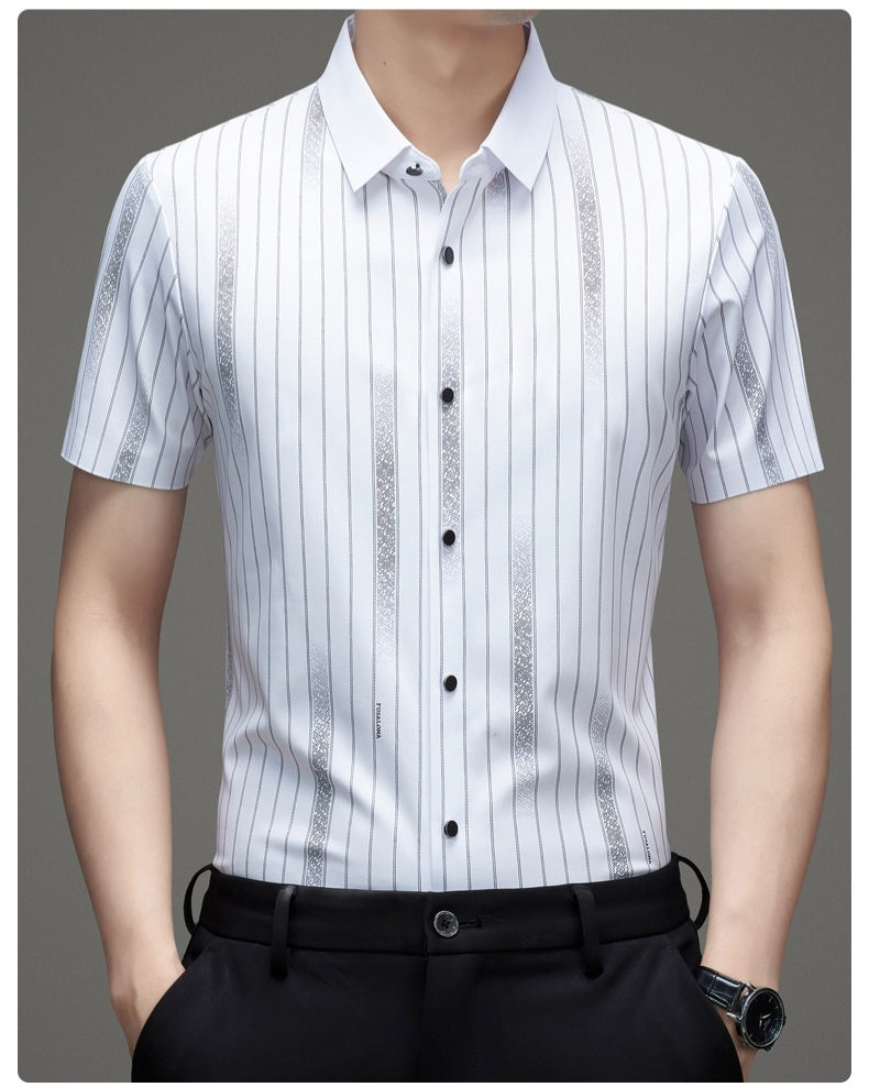 Men wearing Atmora white and grey vertical striped short sleeve stretch shirt styled with black trousers